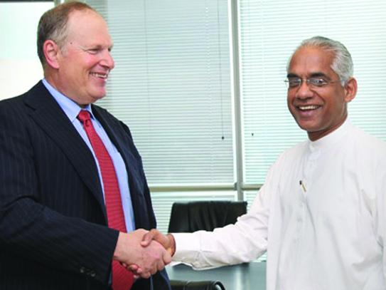 Chairman of Honeywell Corporation Dave Cote with  Former Deputy Minister of Investment Promotion Eran Wickramaratne 