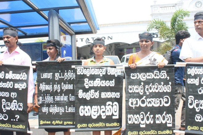 Silent protest against the brutal murder of student Vidya Sivaloganathan in Jaffna
