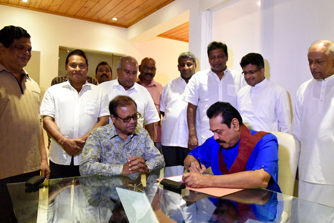 Former President Mahinda Rajapakse signed nomination papers last night: PICS