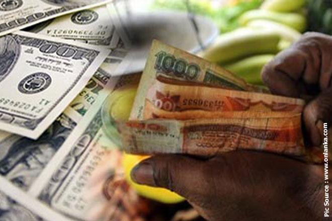 Sri Lankan rupee edges up on exporter dollar sales; shares down