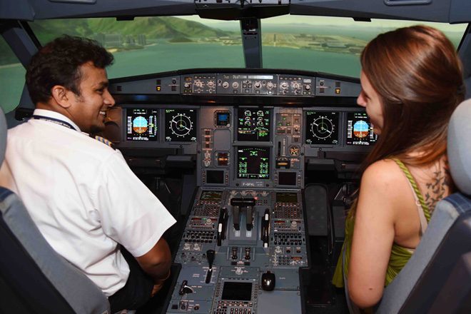 Travel bloggers experience SriLankan Airlines flight simulator