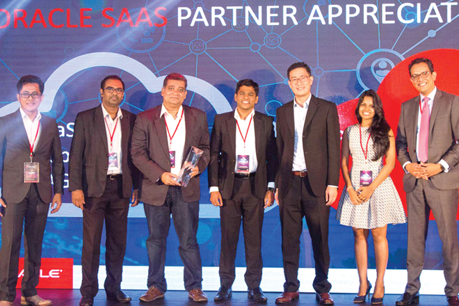 (L-R) Boedi Arjanto (Cloud (SaaS) Regional Senior Alliance Manager, ASEAN at Oracle), Nishan Mendis (Executive Director at PwC Sri Lanka), Channa Manoharan (Advisory Leader/Chief Operating Officer, PwC Sri Lanka), Amila Perera (PwC Sri Lanka, Associate Director - Oracle Cloud Practice Head), Kelly Yu (General Manager at Oracle), Sarala Nirmani (PwC Sri Lanka Oracle Functional Consultant), Nikhil Parambath (Head of Applications, SAGE region at Oracle)