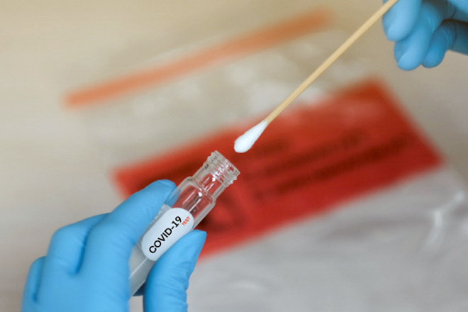 UK approves easy-to-handle Oxford vaccine for COVID