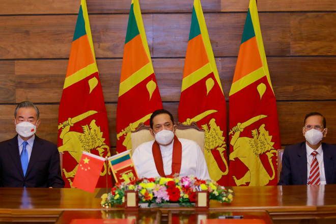 Chinese FM assures to help Sri Lanka; signs agreement on Economic & Technical Cooperation