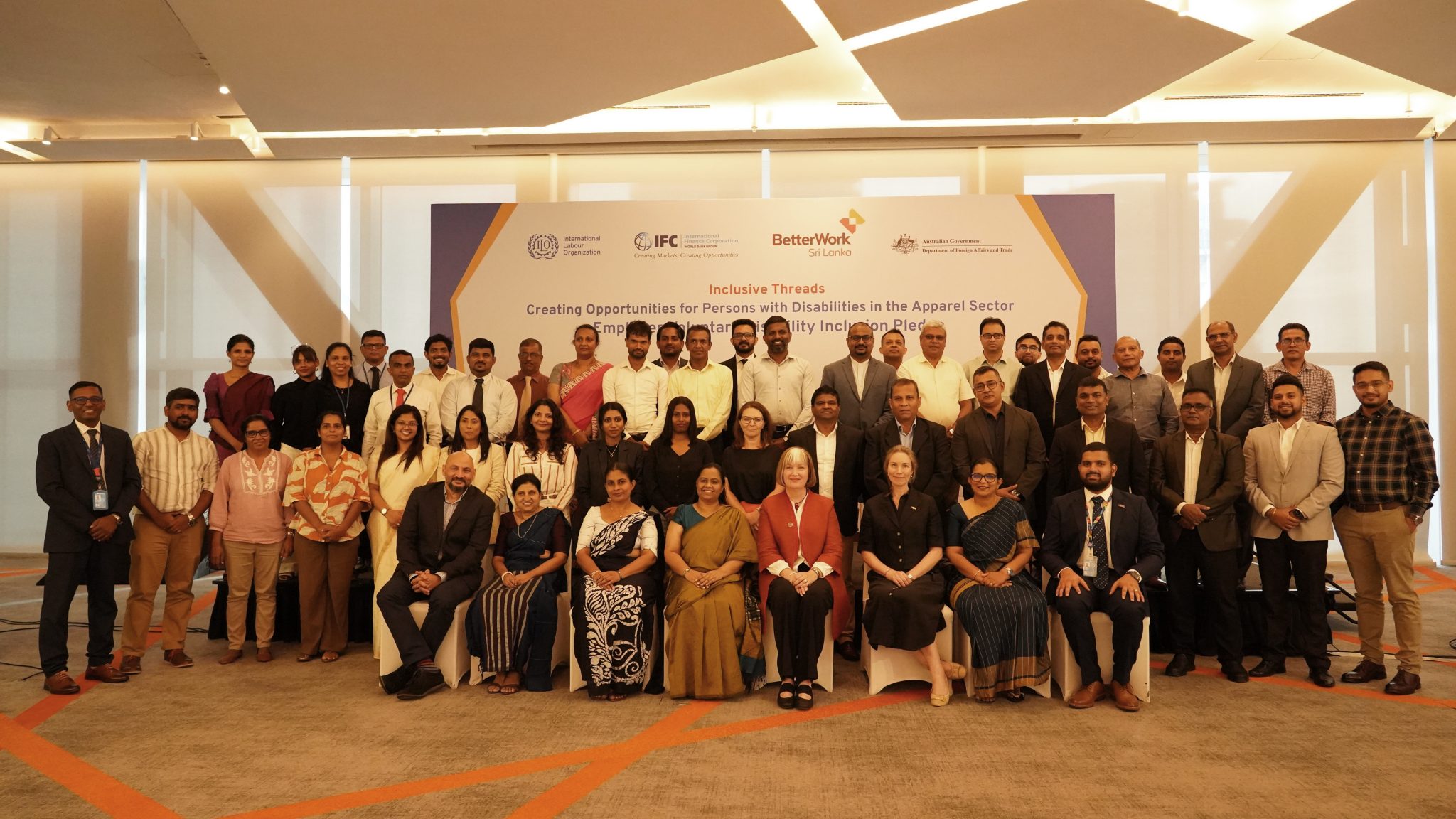 Representatives of thirteen Sri Lankan apparel companies and partner organisations at the Inclusive Threads pledge ceremony in Colombo