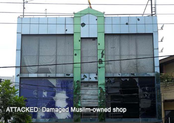 Damaged Muslim-owned store in in Sri Lanka targeted by nationalists